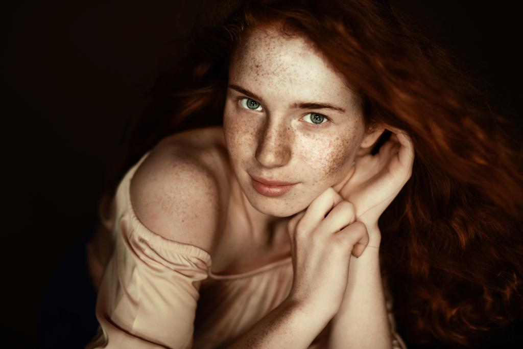 stock-photo-tender-freckled-redhead-woman